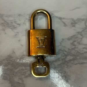 Louis Vuitton Lock & Key 311 Authentic